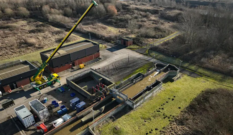 A crane lifting a pump into place at Portrack Wastewater Treatment Works, on hire from Selwood Middlesbrough