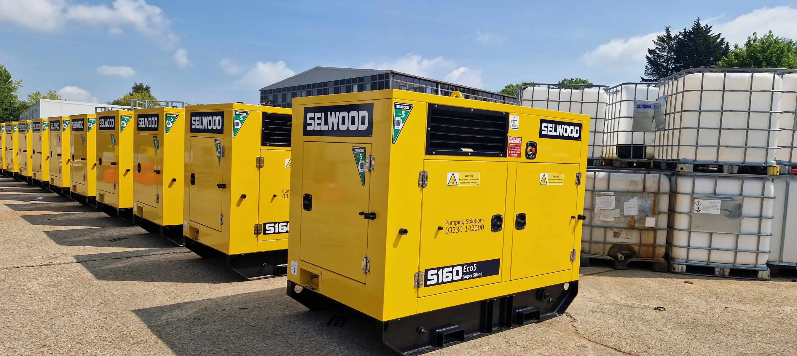 A line of Selwood S160 pumps at a Selwood depot, available to hire across North Wales and Northern Ireland