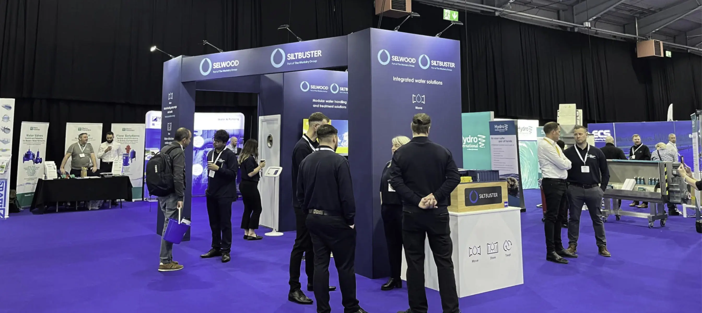 Selwood and Siltbuster at a conference promoting One Workdry as The Workdry Group