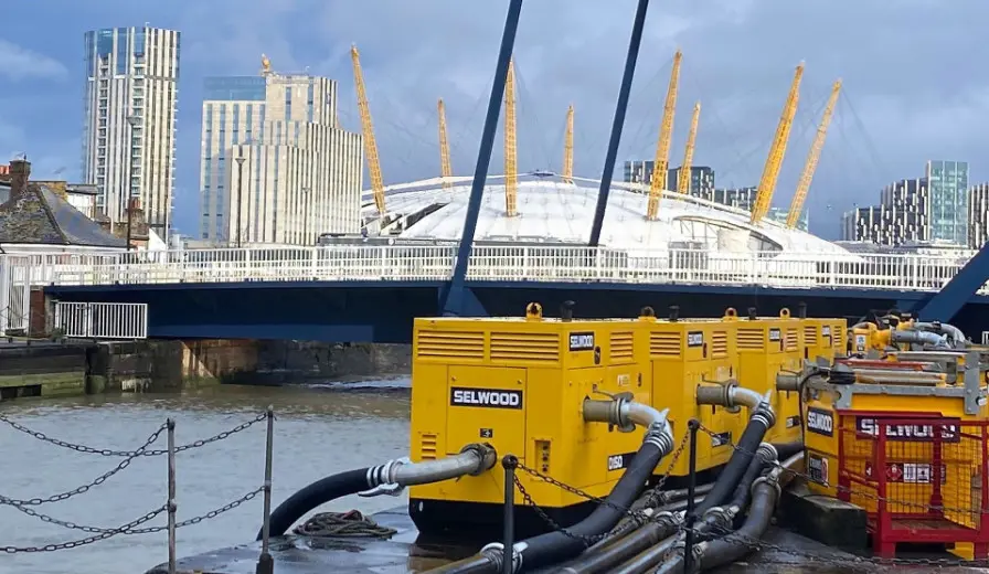 Selwood pumps on hire along the River Thames near to the O2 in Greenwich, South East London